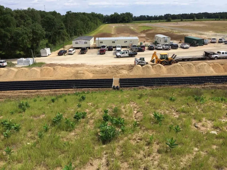 Large commercial drainfield beside a mobile home park