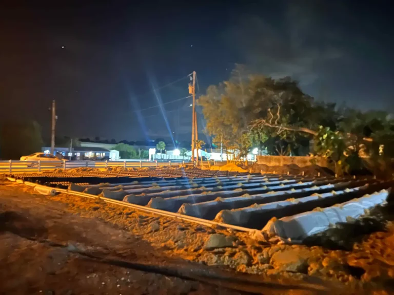 Commercial drainfield lit up at night