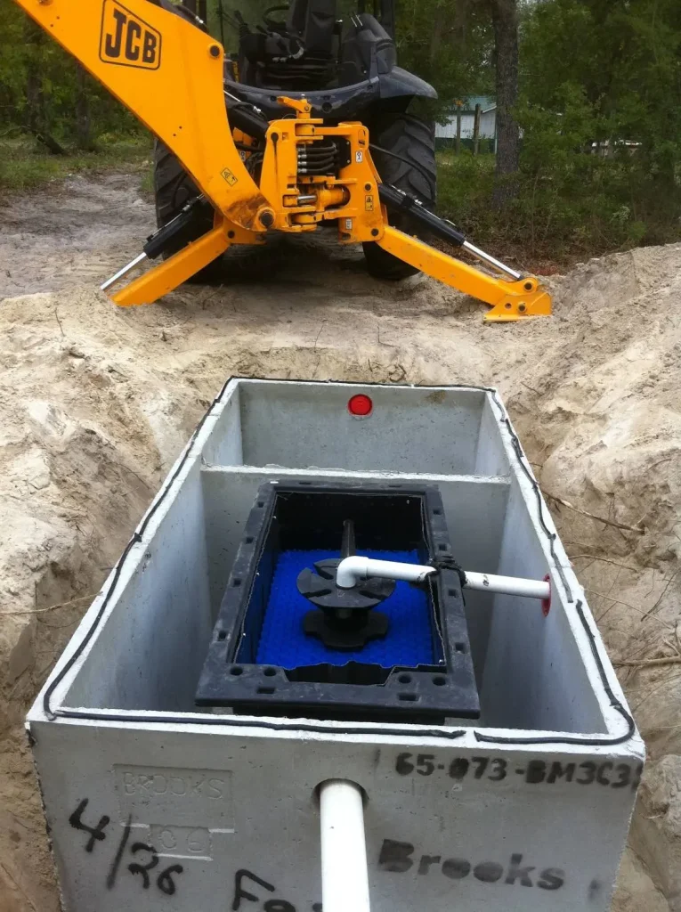 Aerobic treatment unit installed in a pit